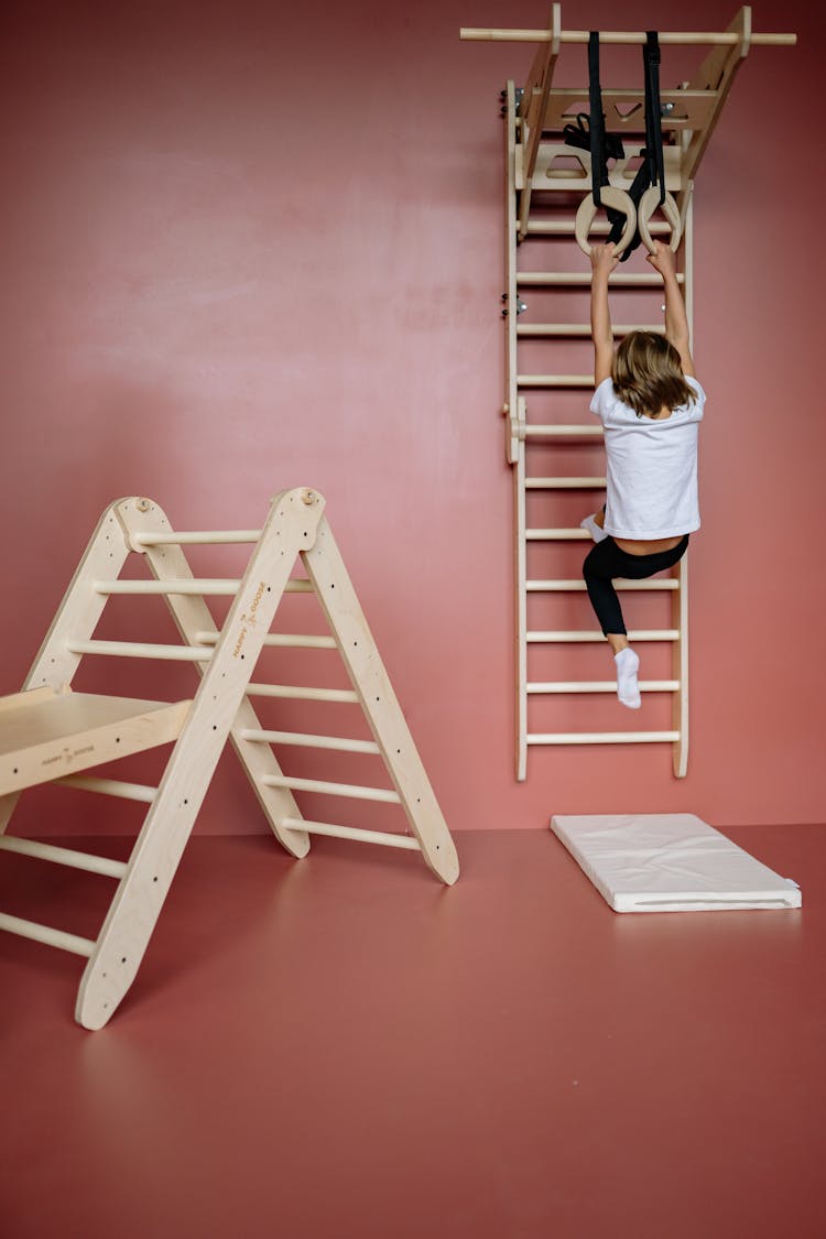Child Climbing Ladder