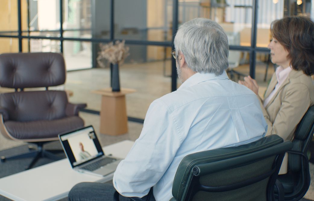 couple enjoying online dating experience on tablet