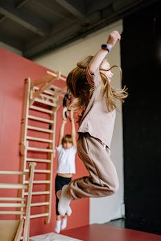 Children Jumping in Indoor Gym