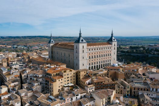 Stunning aerial view of the Alcazar, a historic Renaissance palace in Toledo, Spain.