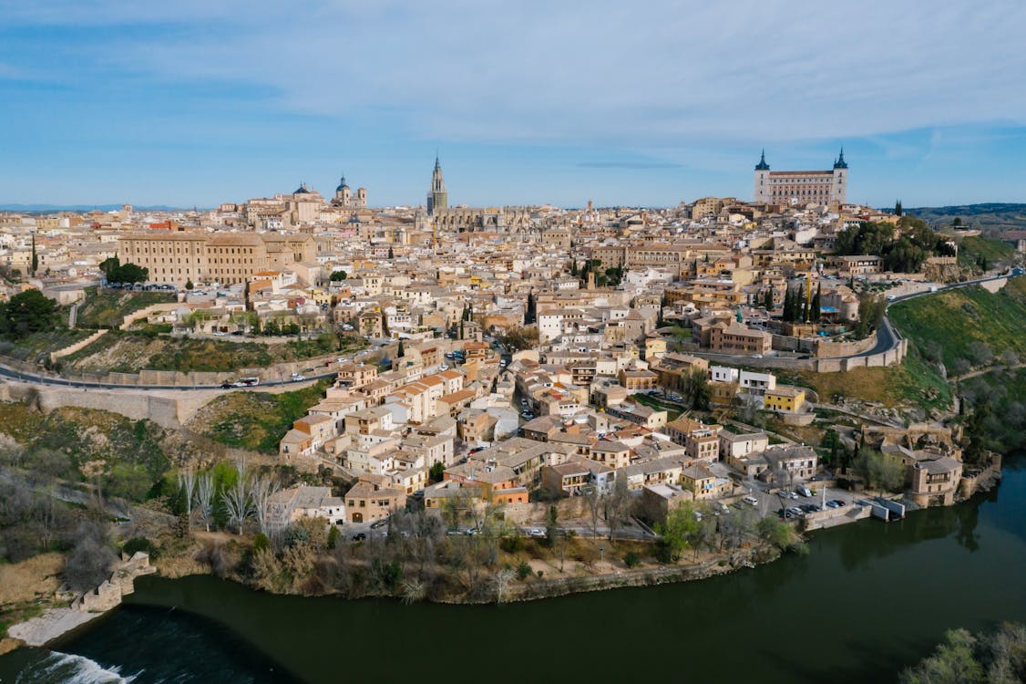 Free Breathtaking aerial view of Toledo, Spain, showcasing historic architecture and the Tagus River. Stock Photo