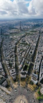 Stunning aerial photograph showcasing the iconic Eiffel Tower and intricate urban layout of Paris.