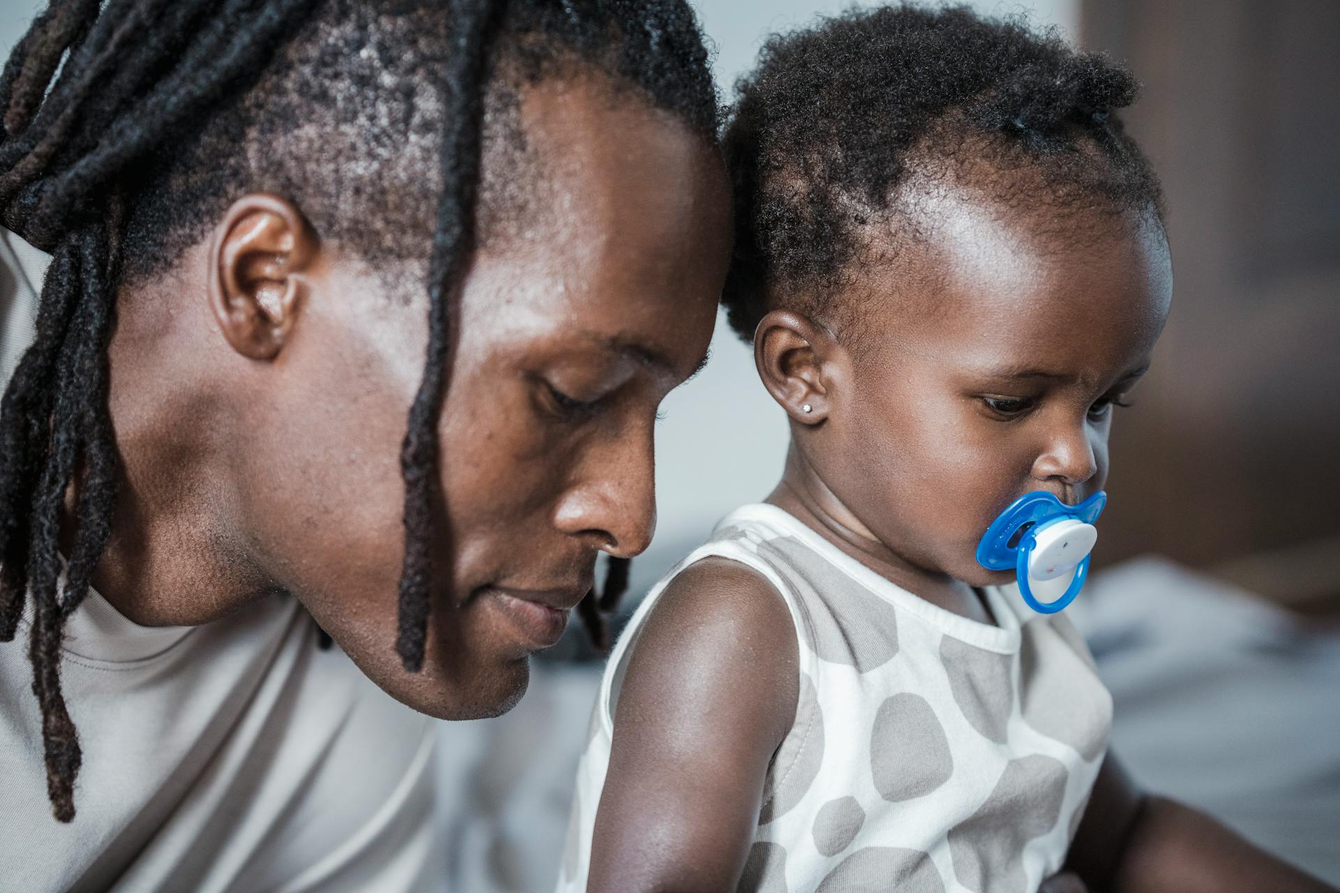 Portrait of Father with His Baby Daughter