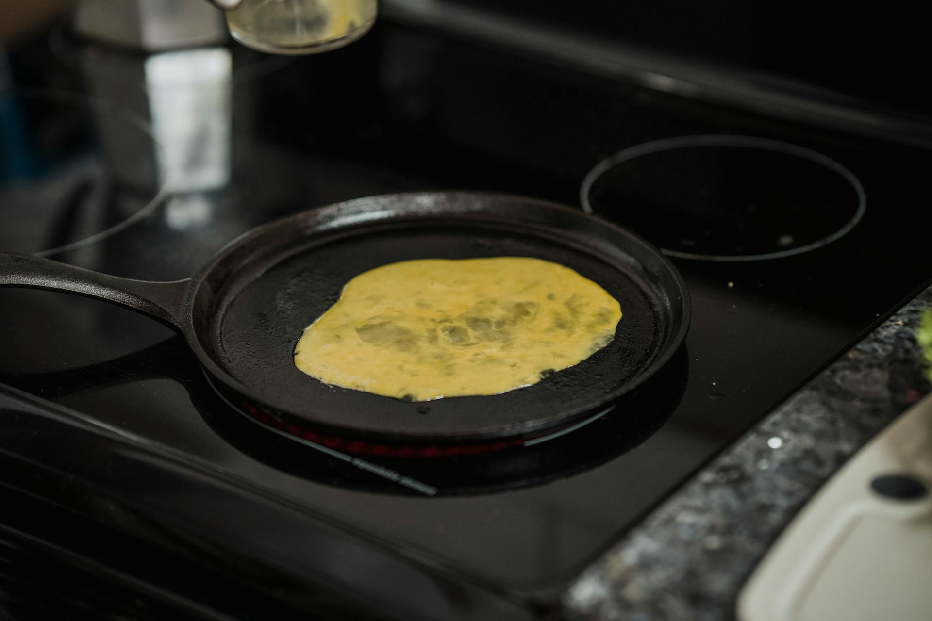 Black Frying Pan on an Induction Stove