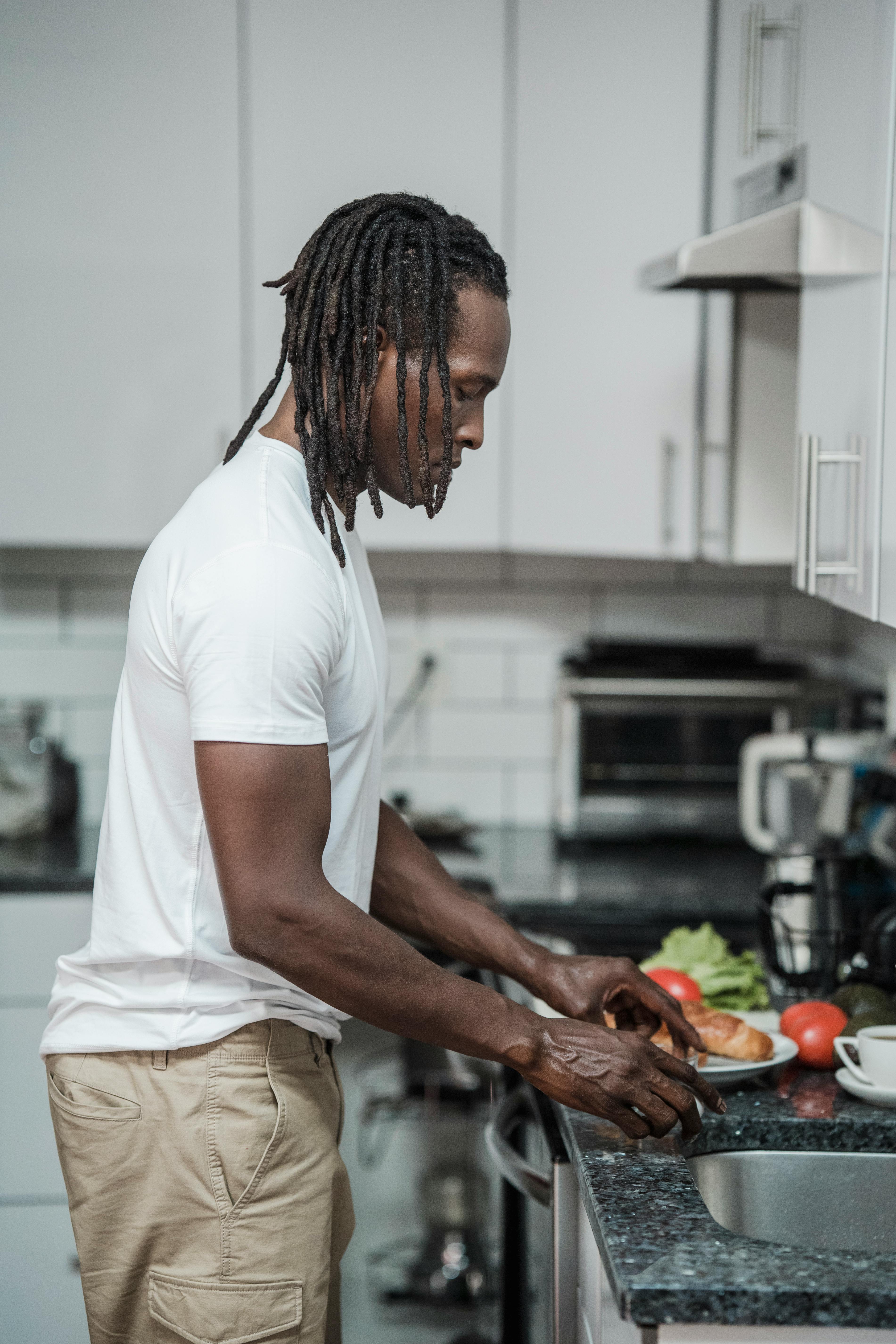 black man cooking