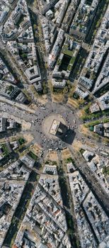 Stunning aerial shot of the Arc de Triomphe and surrounding streets in Paris.