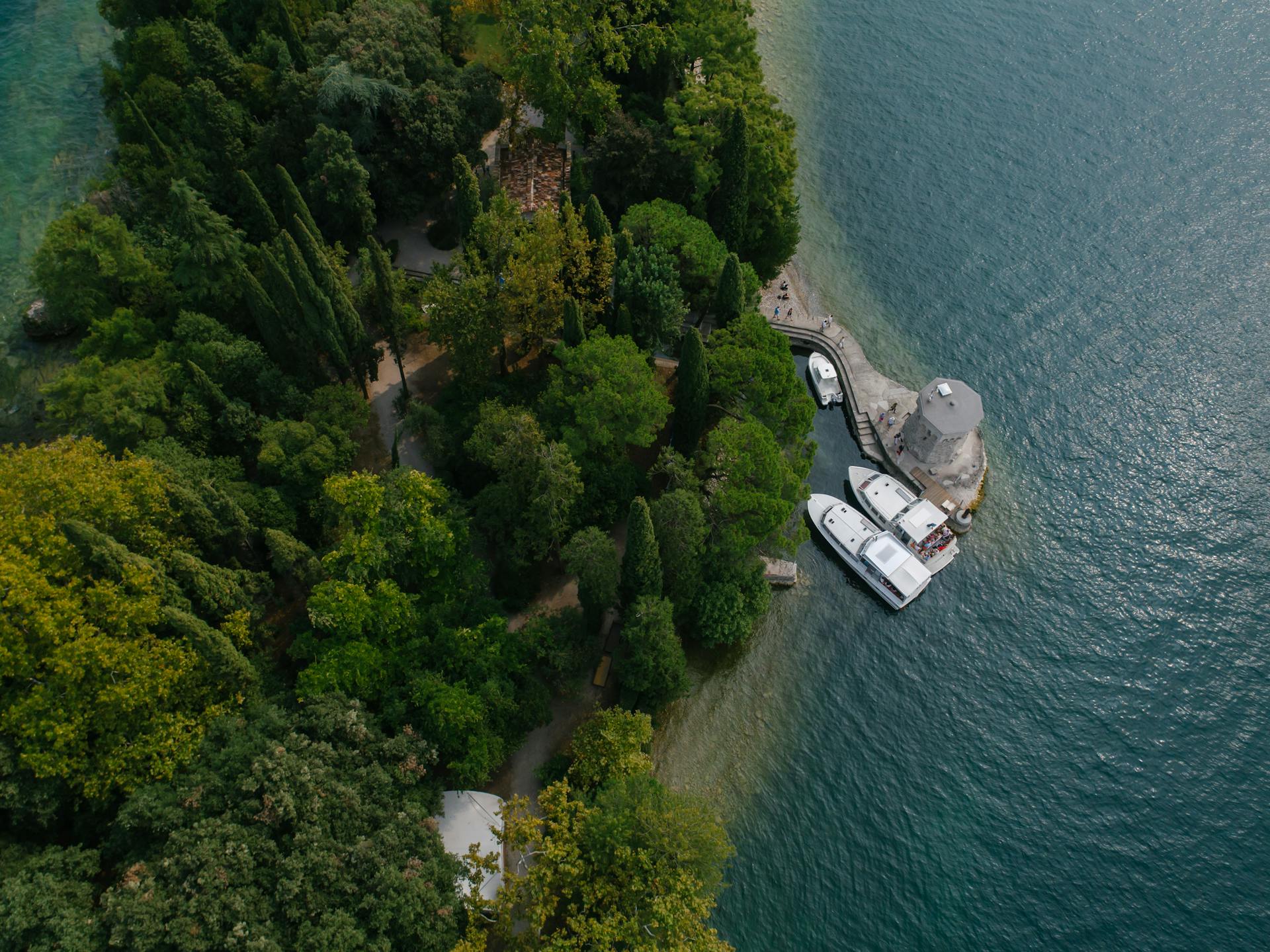 Drone Shot of Yachts Docked near a Tower