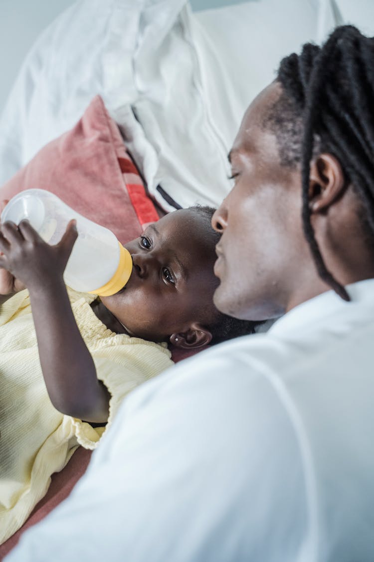 Child Drinking From Bottle