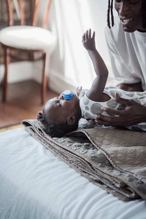 Free A Father Taking Care of His Daughter Stock Photo