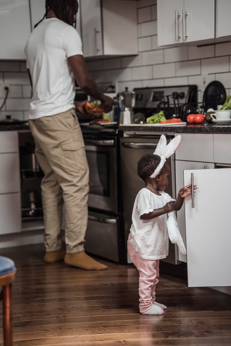 Father And Daughter In The Kitchen