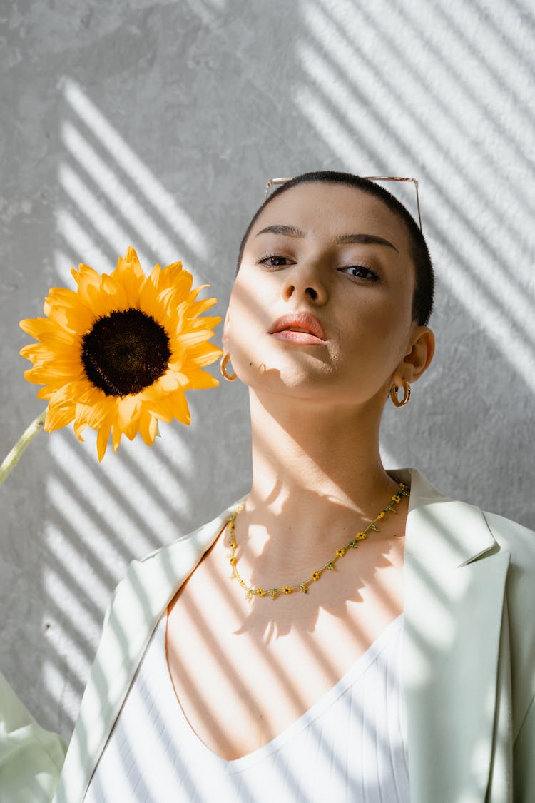 Sunflower Near A Woman's Face