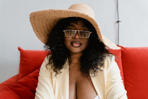 Close Up Photo of Woman Wearing Straw Hat