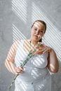 Woman Holding Flowers