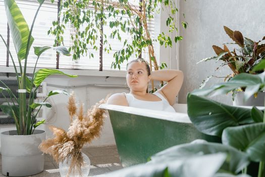 Woman in Bathtub With Water