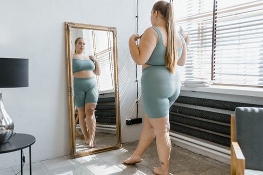A Plus-Size Woman in Gray Tank Top