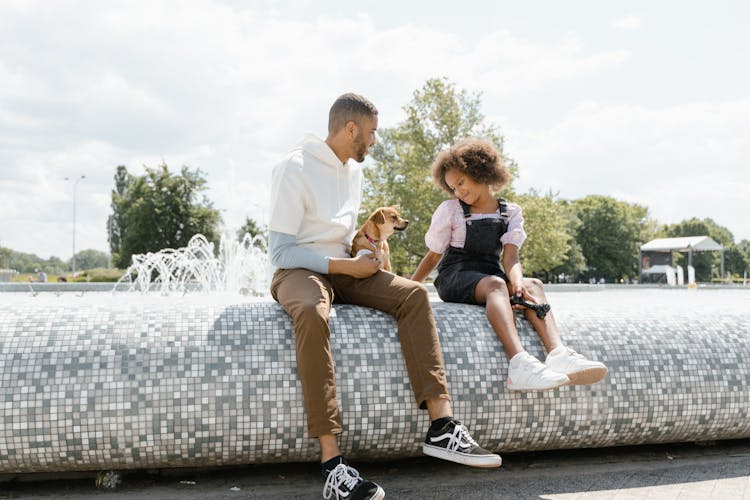 Man And Girl At The Park