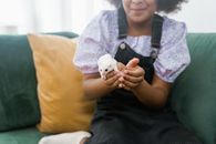 A Young Girl Holding Her Pet