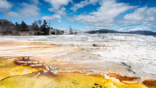 Free Explore the breathtaking geothermal terraces at Mammoth Hot Springs, Yellowstone National Park. Stock Photo