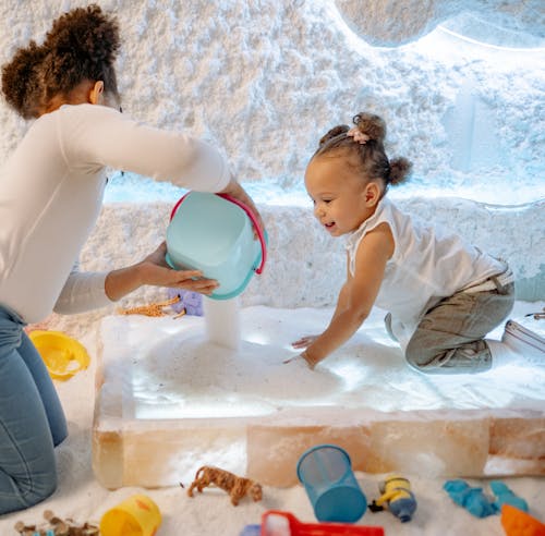 Free Two Kids Playing with Toys Stock Photo