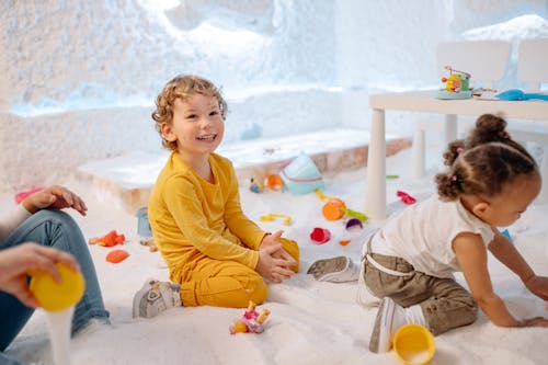 Free Two Children Playing with Toys Stock Photo