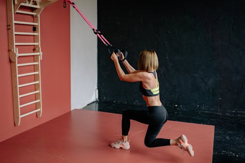 Woman Wearing Black Leggings Exercising