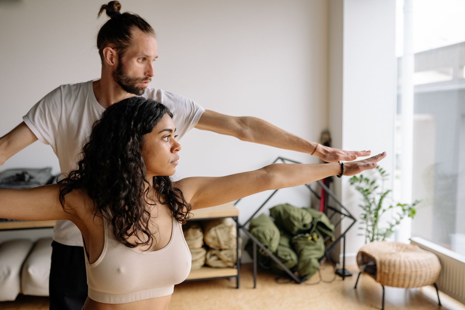 Person adjusting a slim lower back support belt before everyday activity