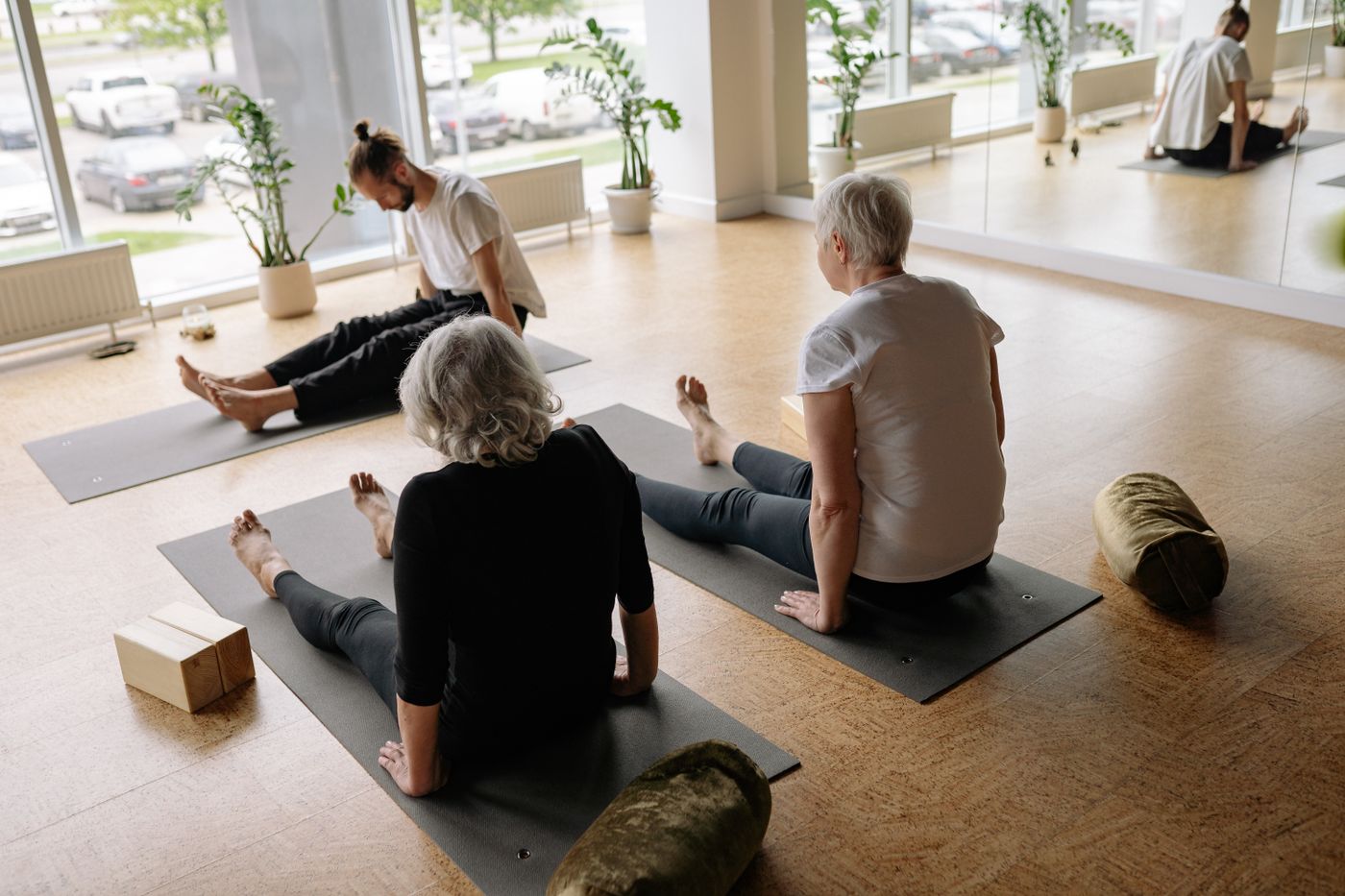 Beginner yoga class practicing foundational poses