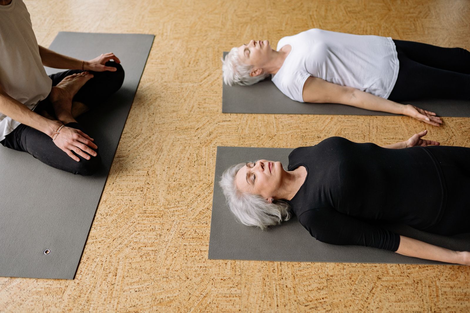 Practitioner sitting cross-legged practicing yogic breathing as part of shatkarma kriyas