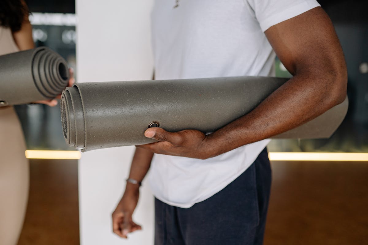 Different wearable health tracking devices laid out on a table