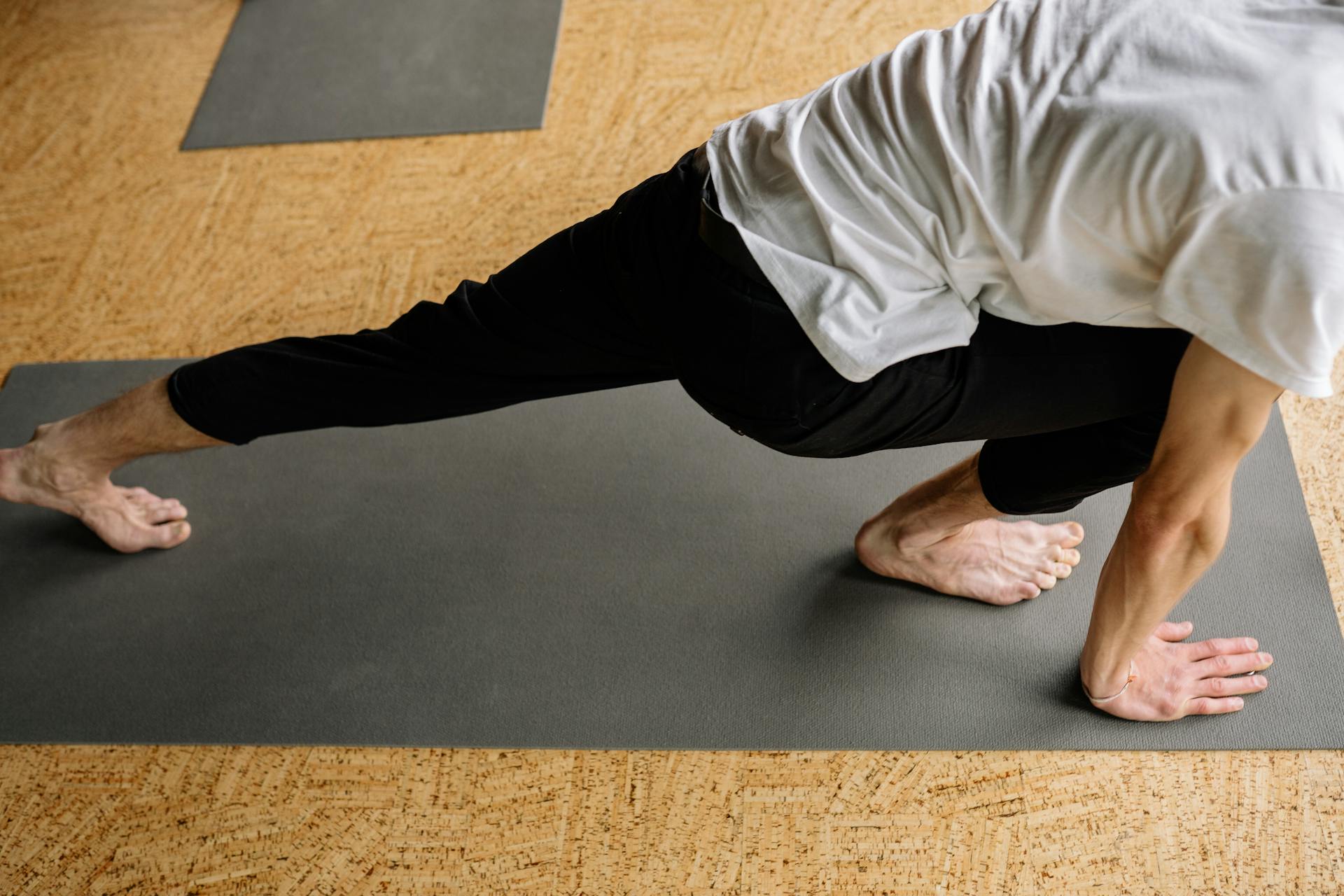 A Person Doing a Crescent Lunge Yoga Position