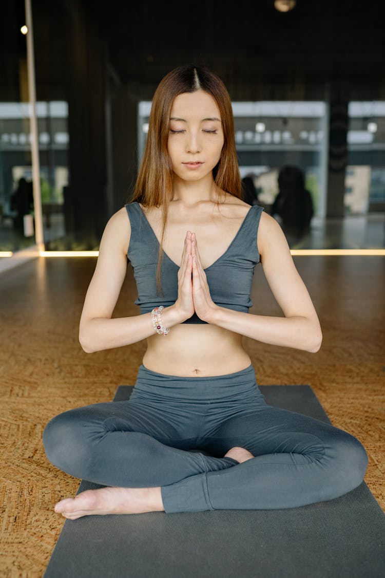 Young Woman Practising Yoga 