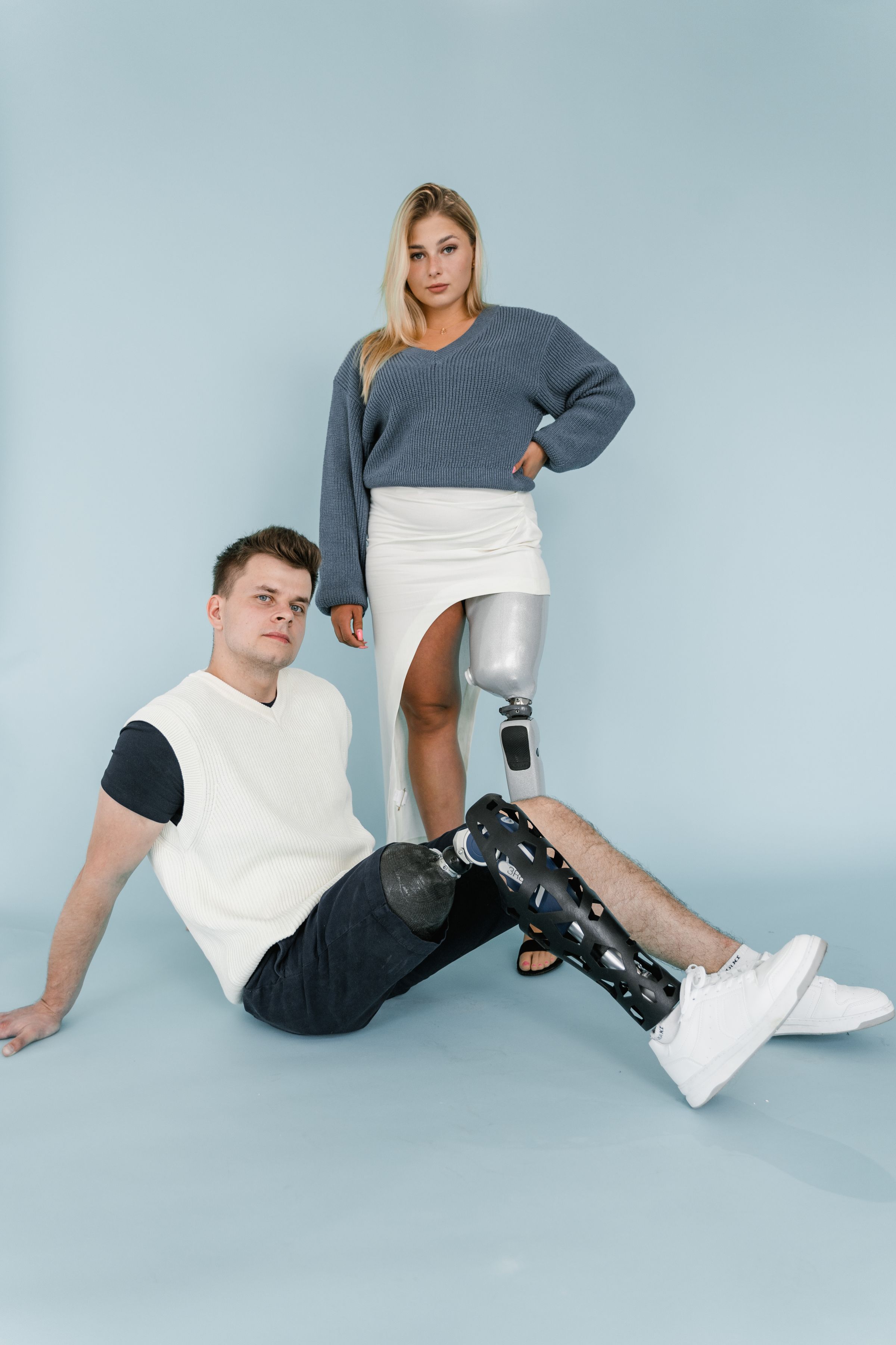 Person in wheelchair dressed in stylish everyday clothing