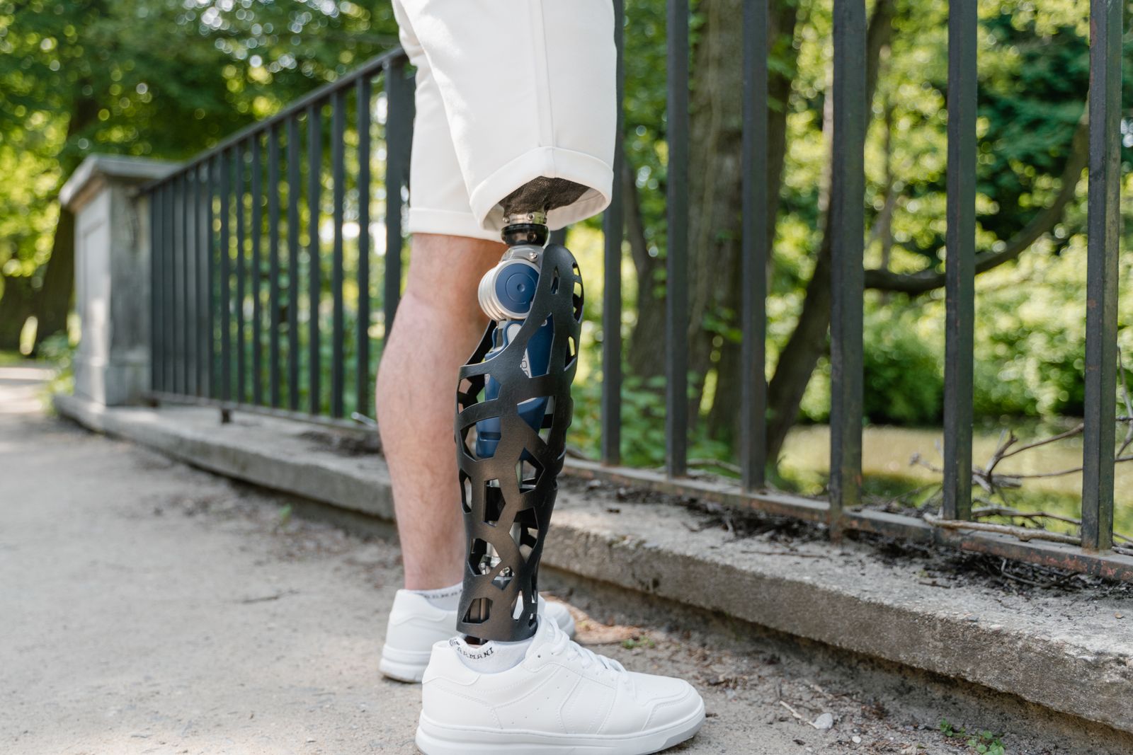 Senior adult walking outdoors with steady knee movement