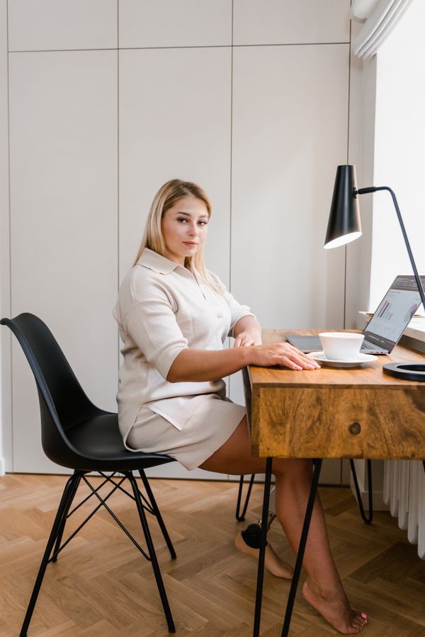 Woman wearing a knit midi dress for work