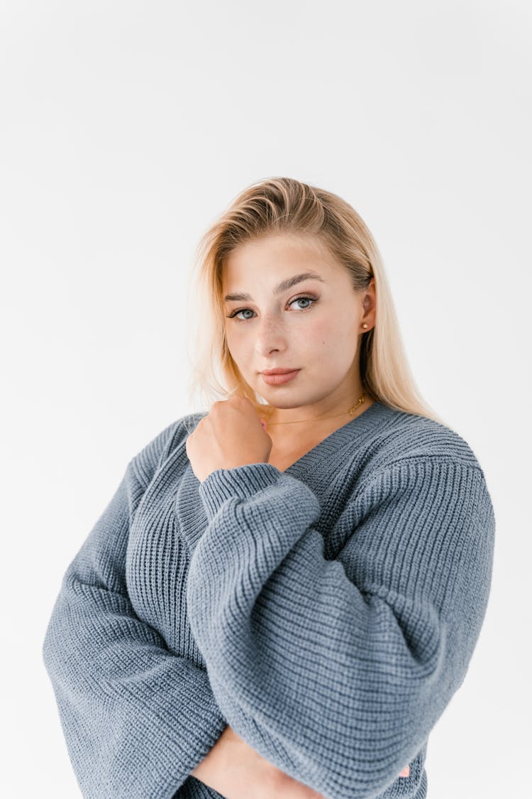 Close Up Photo Of Blond Woman Wearing Sweater