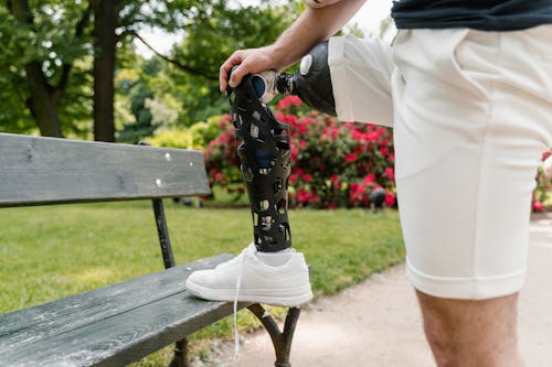 A Person in White Short Wearing White Shoes