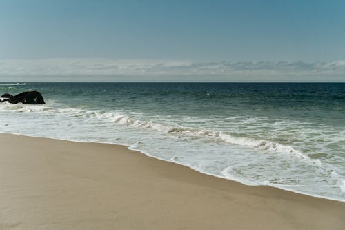 Бесплатное стоковое фото с вода, волны, горизонт