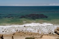Sea Waves Crashing on Rocky Shore