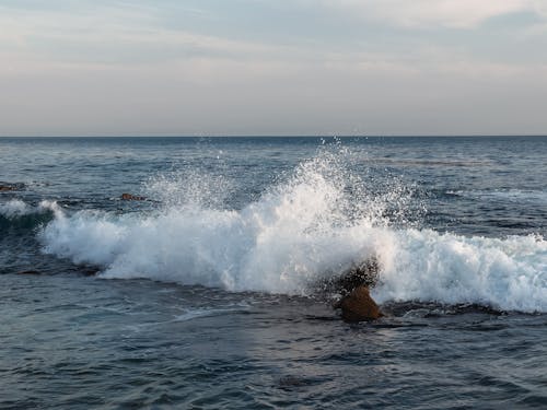 Sea Waves Crashing on a Rock