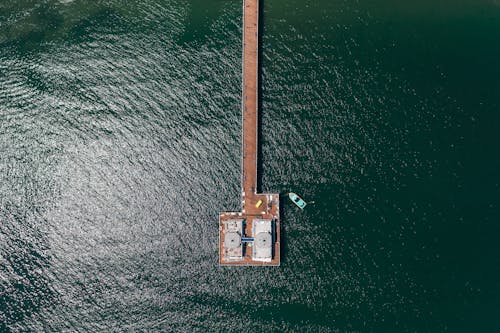 Foto profissional grátis de água, barco, doca de madeira