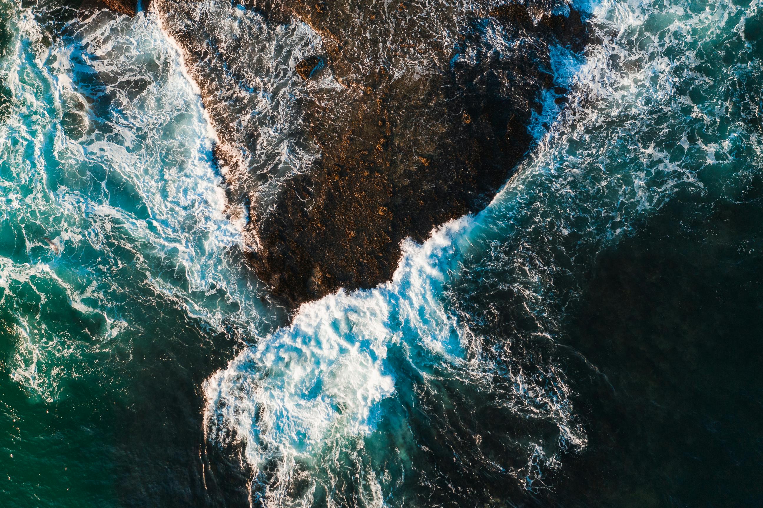 Aerial Photography of Ocean Waves Crashing on Rocky Shore · Free Stock ...