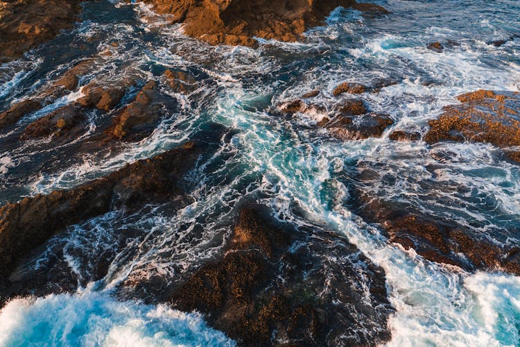 Ocean Waves Crashing On Rocks