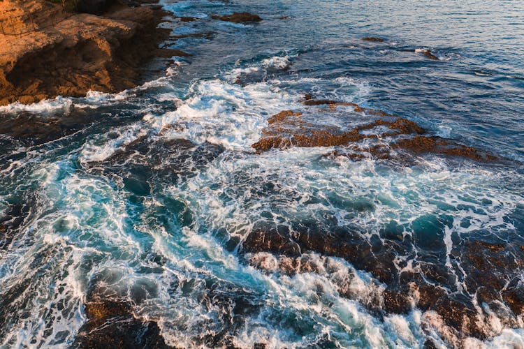 Ocean Waves Crashing On Rocks