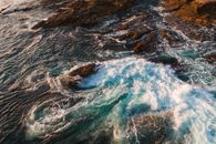 Ocean Waves Crashing on Rocky Shore