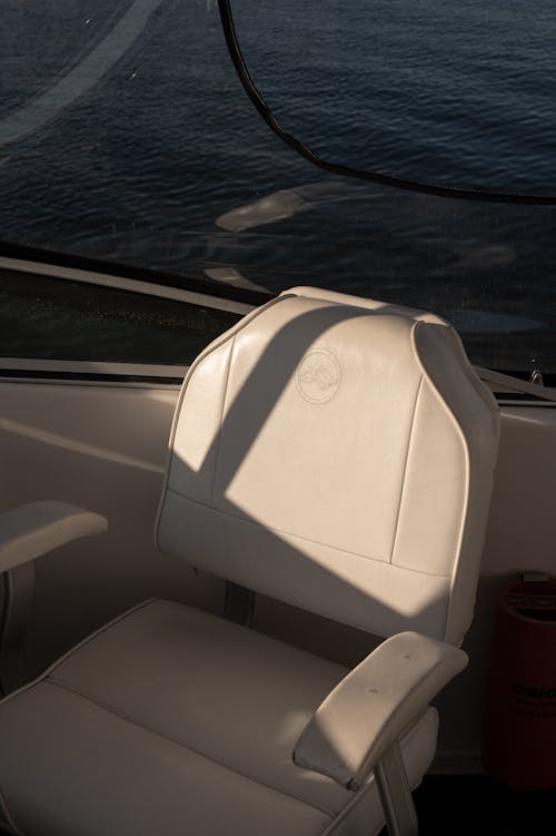 Cushioned Leather Seat Near Body of Water