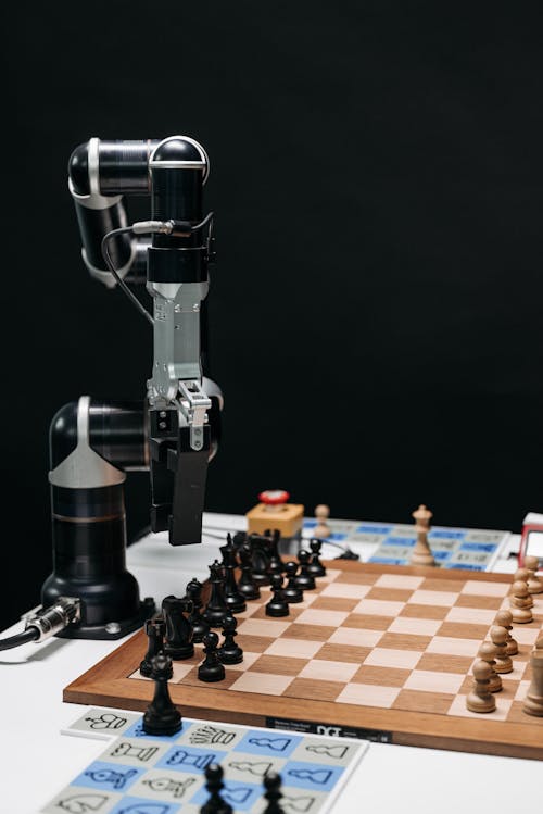Robotic Arm of Artificial Intelligence Playing Chess