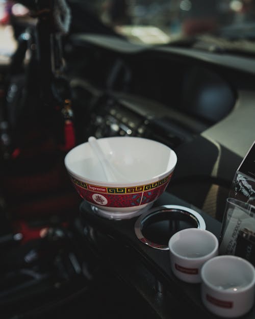 Ceramic Bowl and Teacups inside a Car