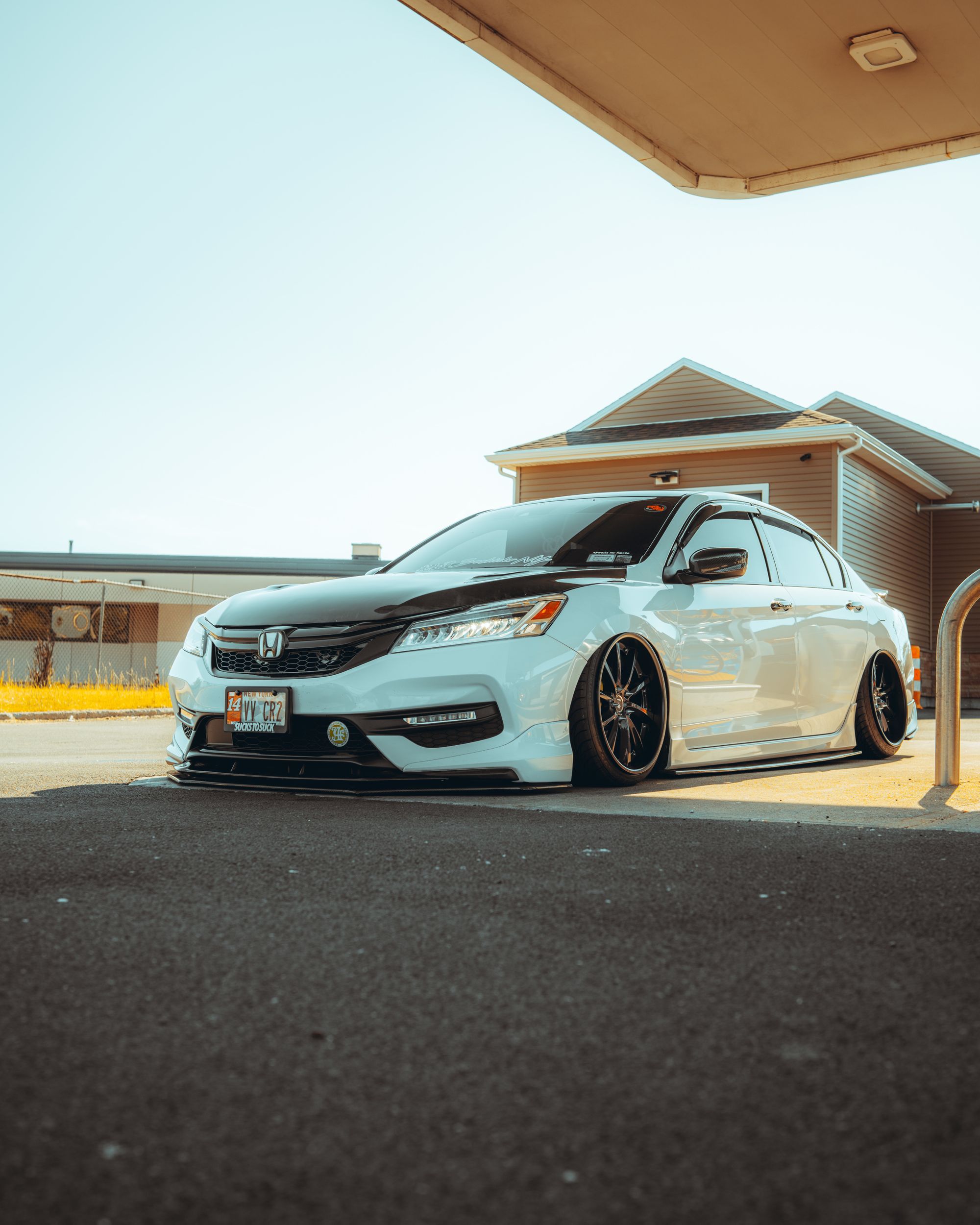 A Honda Accord sedan in a US parking lot setting is the closest match to the Marysville-built Accord discussed in the…