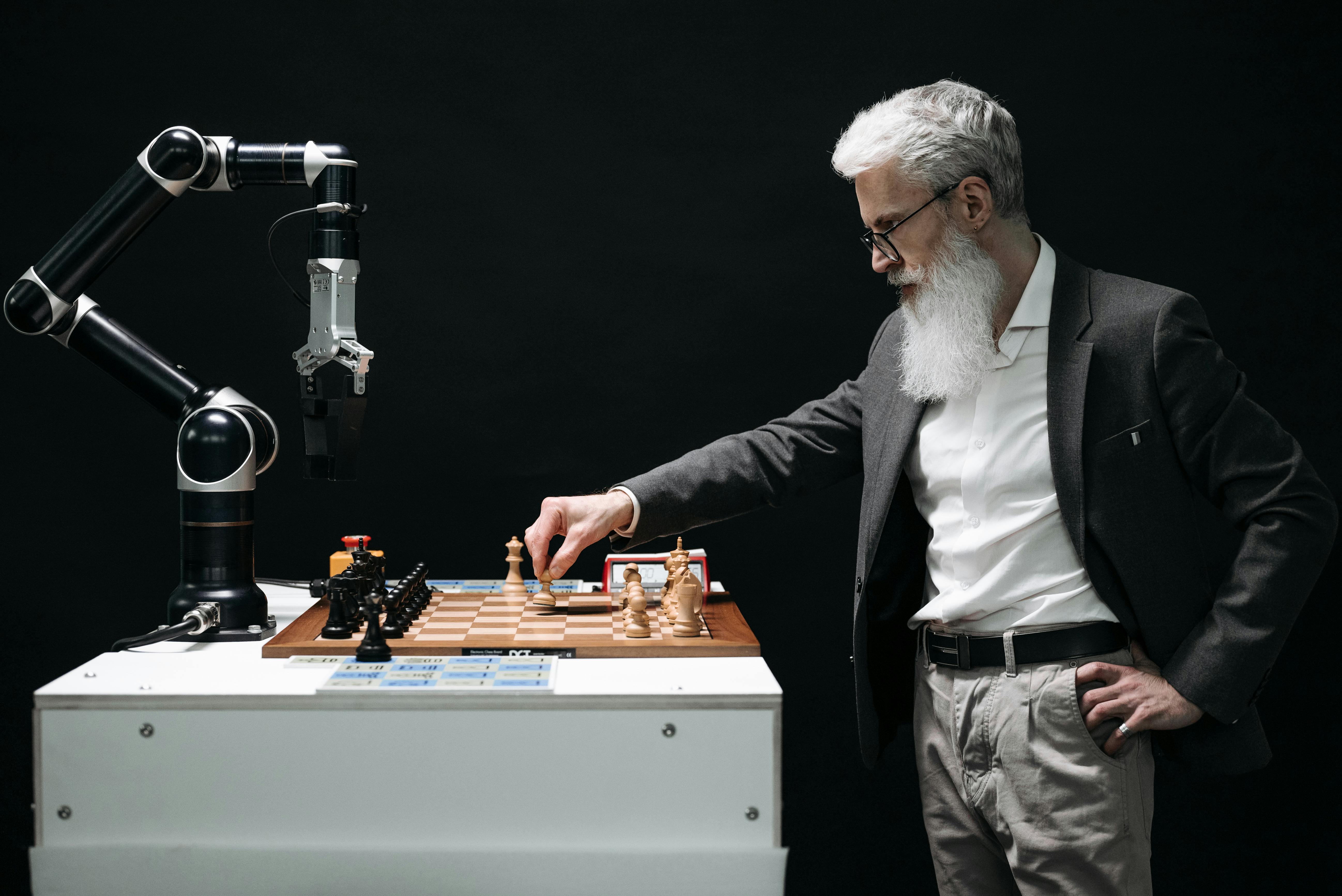 a bearded man playing chess