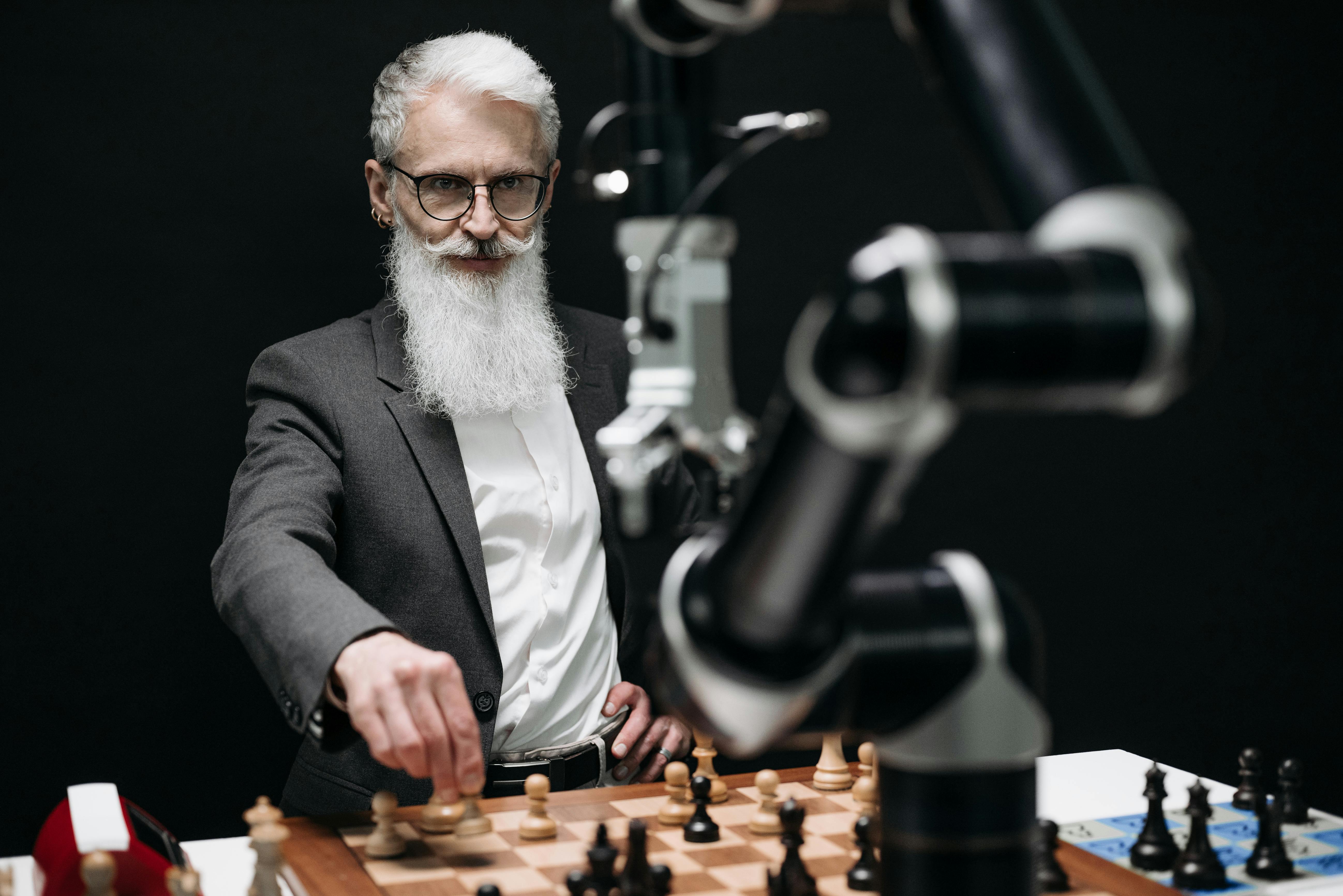 a bearded man playing chess